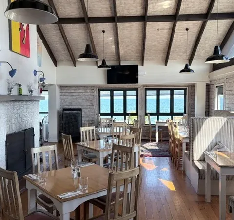 Tables and comfortable seating in the dining room