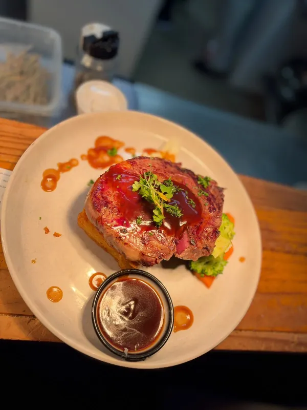 A meal from the Lakefront kitchen, served at a timber table